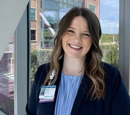 Annie Weckesser standing in the cancer center sky tunnel