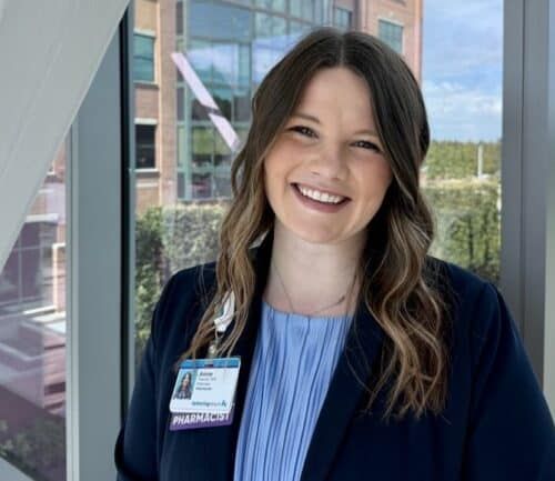 Annie Weckesser standing in the cancer center sky tunnel