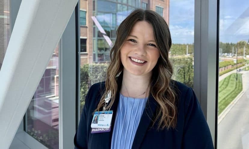 Annie Weckesser standing in the cancer center sky tunnel